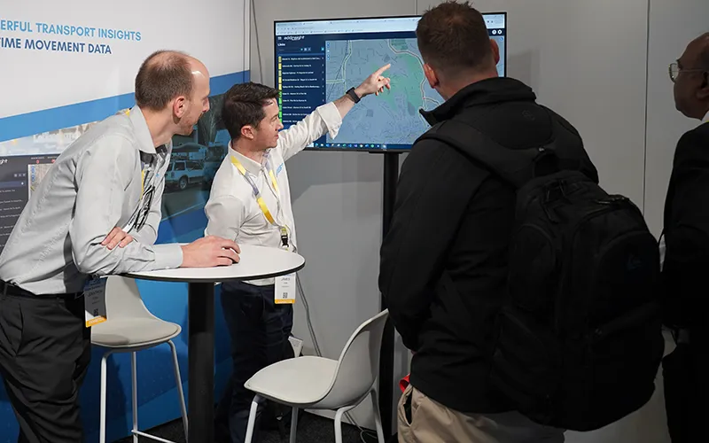 Addinsight's James Cox (middle) and Jonathon Rossi (left) demonstrate capabilities within the Addinsight platform at Summit 2023.