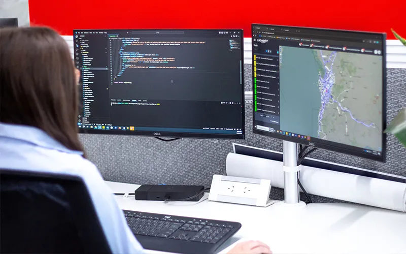 Jess working with her dual screen setup.