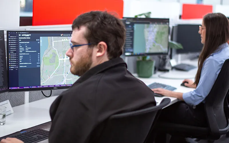 Luke working alongside Jess during a day in the office.