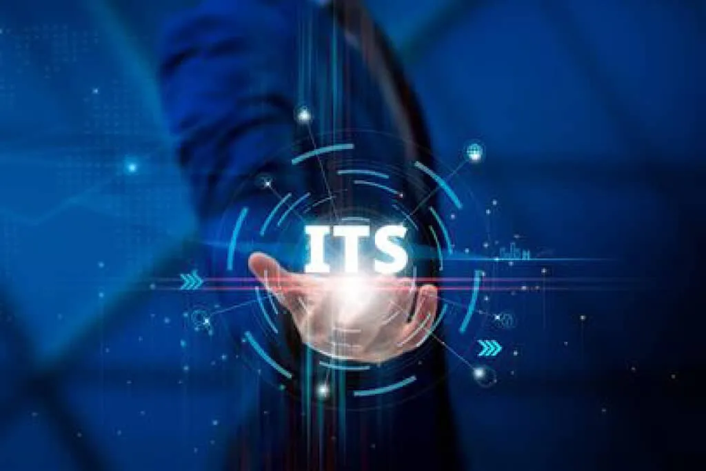 Hand holding glowing "ITS" text on a blue background